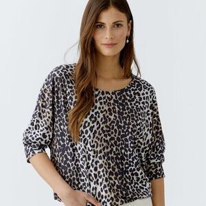 Oui animal print blouse Size 12 long sleeve leopard cheetah jersey button down